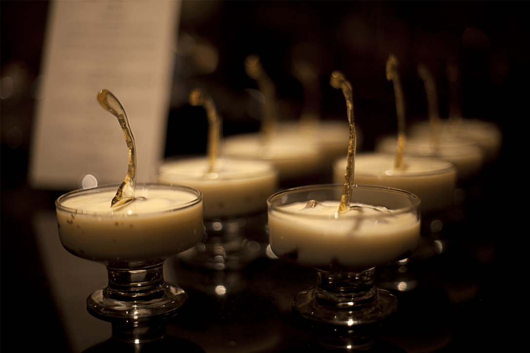 Black & White Mousse—Black tea dark chocolate, and cardamom-Grand-Marnier white chocolate mousses with a sugar-glass garnish